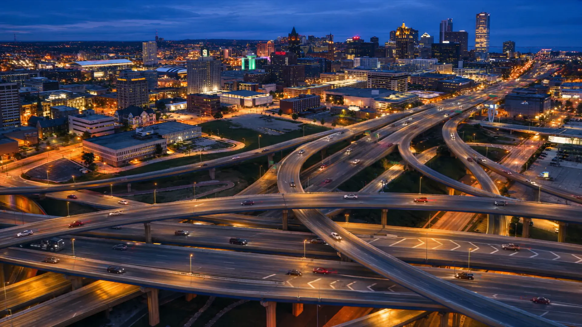 Milwaukee skyline at blue hour above the Marquette Interchange